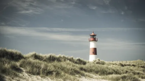 Düneblandschaft mit Leuchtturm