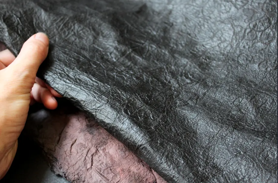Bild von tierfreiem, schwarzen Leder
